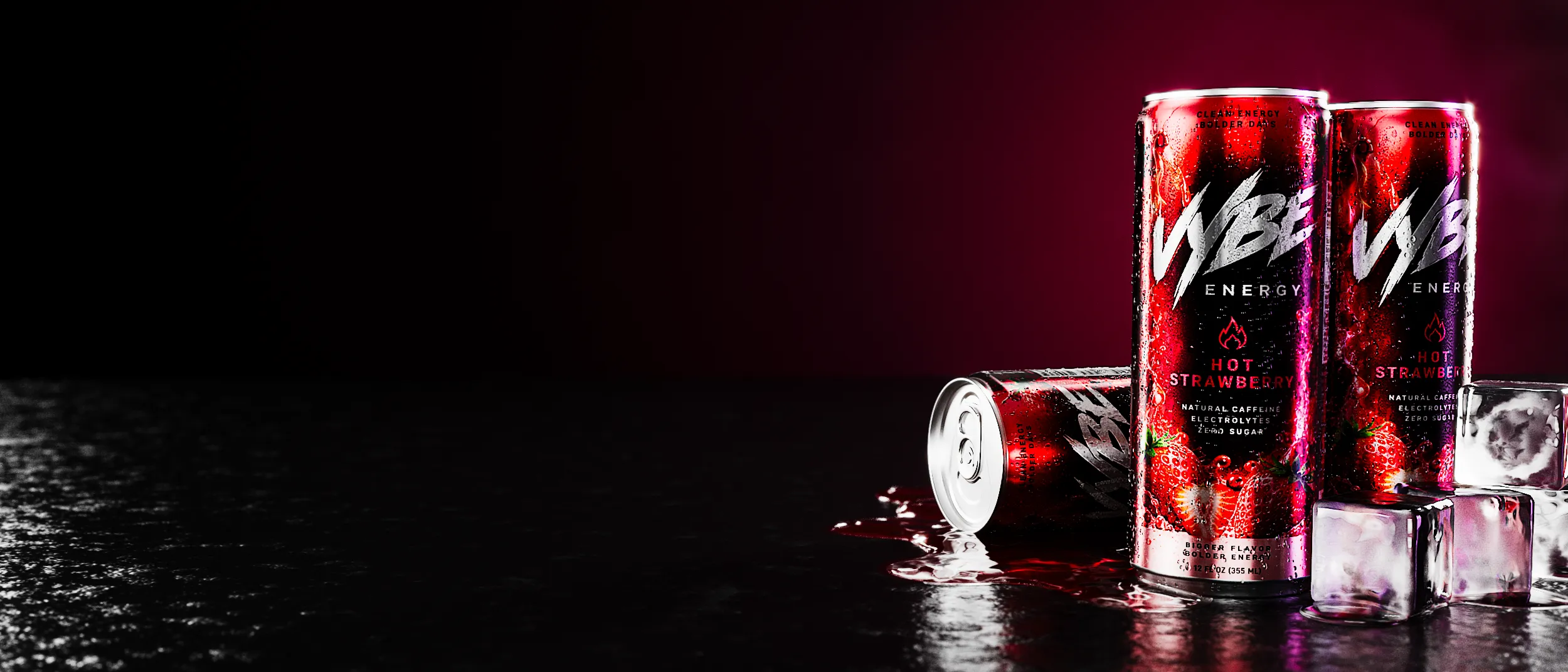 Three beverage cans presented as a consistent product range